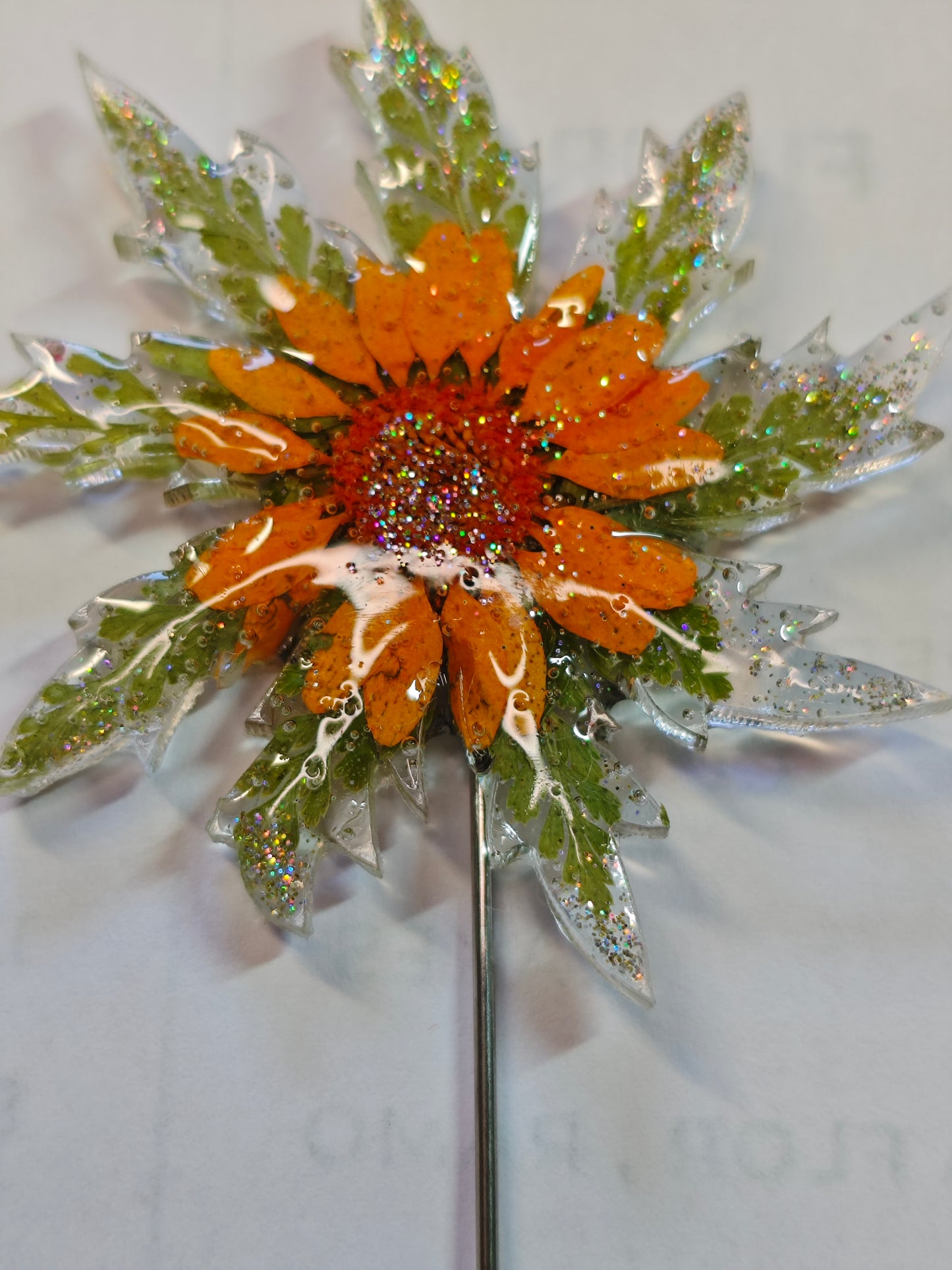Broche Eguzkilore flor naranja
