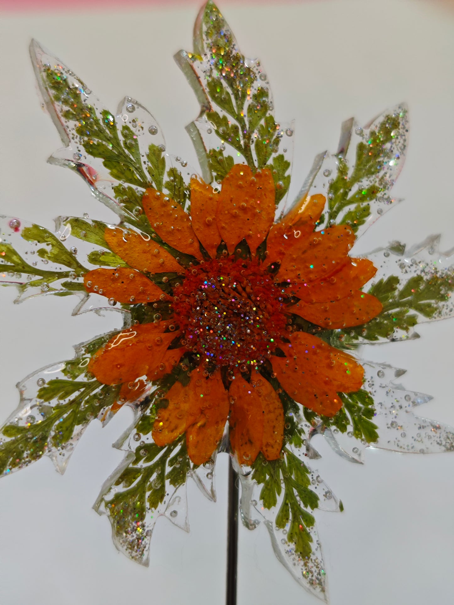 Broche Eguzkilore flor naranja